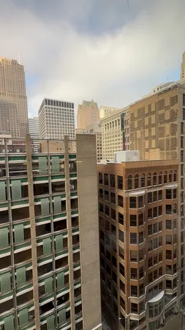 a view of a building with glass windows