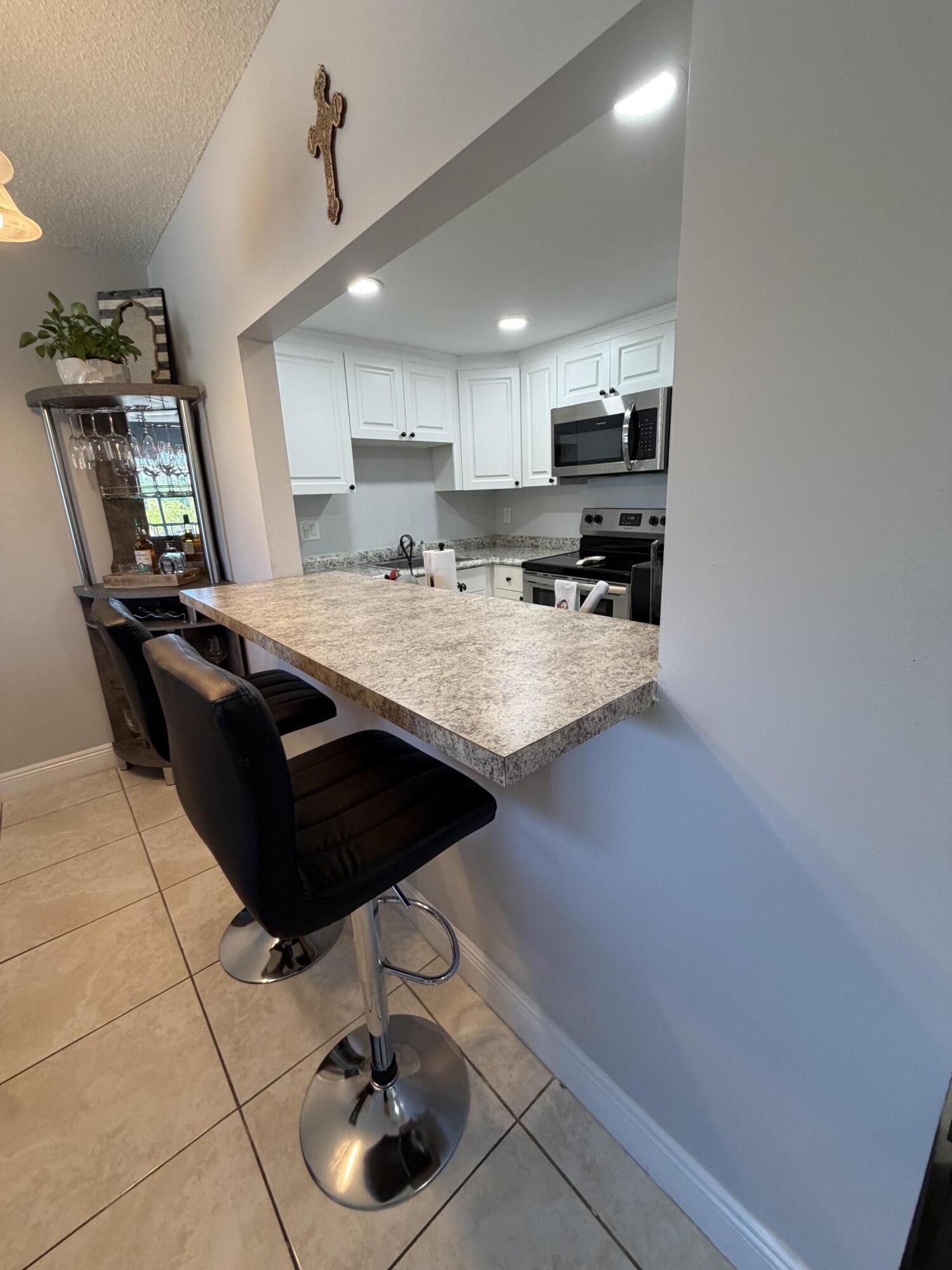 4174 Inverrary Drive, Unit 309 Lauderhill, FL 33319 - Photo 10 of 24 Hightop Counter