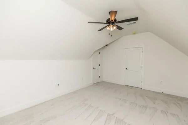 a view of a room with closet and wooden floor