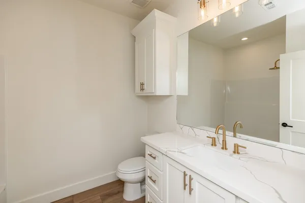 a bathroom with a sink and a toilet
