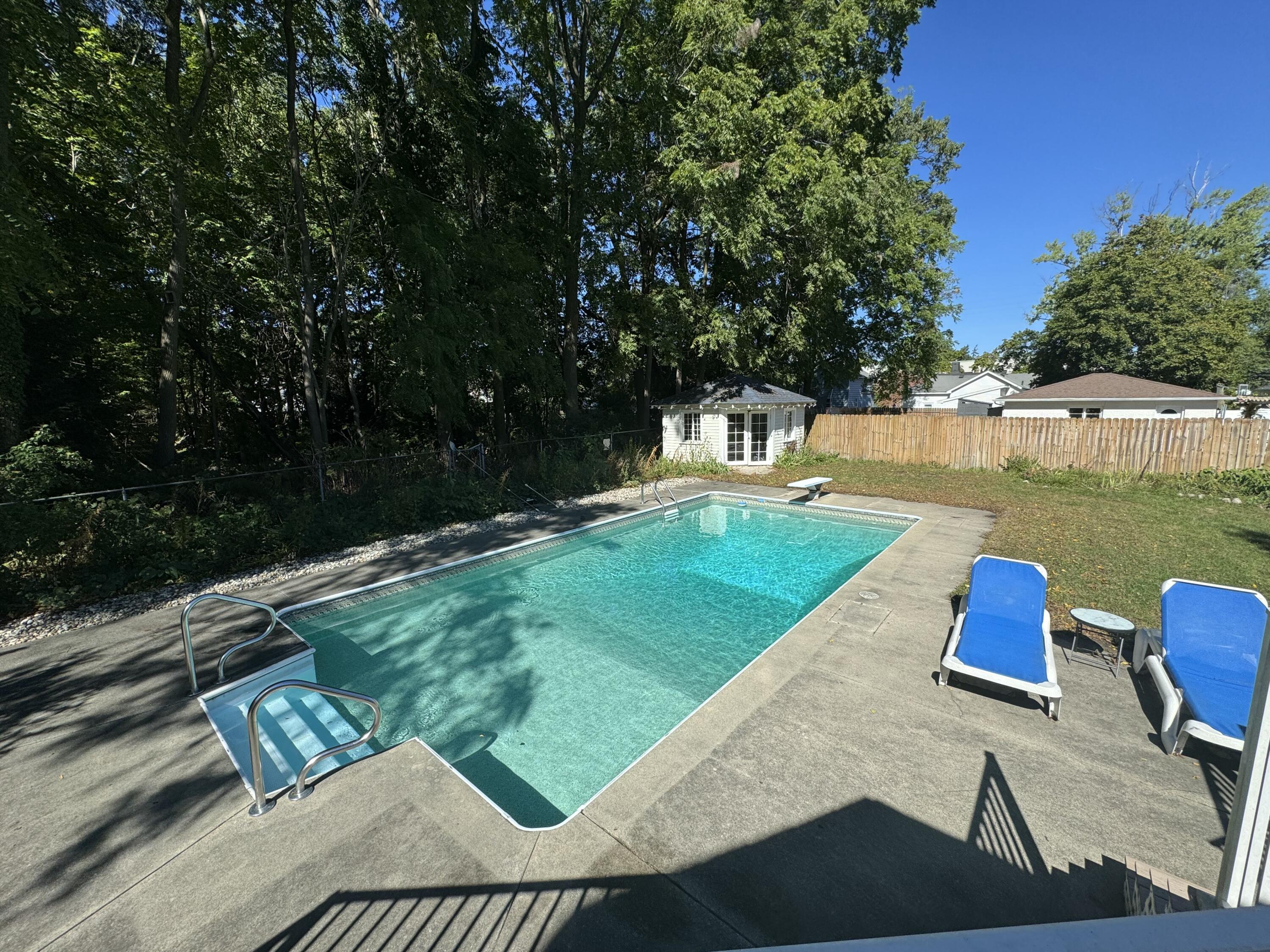 211 Williams Street Spring Lake, MI 49456 - Photo 11 of 67 summer 2025 pool