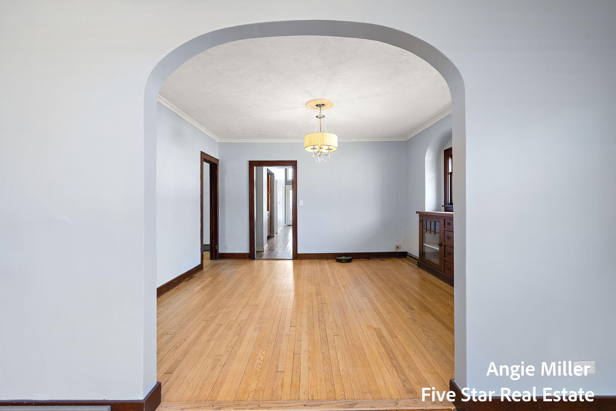 211 Williams Street Spring Lake, MI 49456 - Photo 23 of 67 archway to dining room