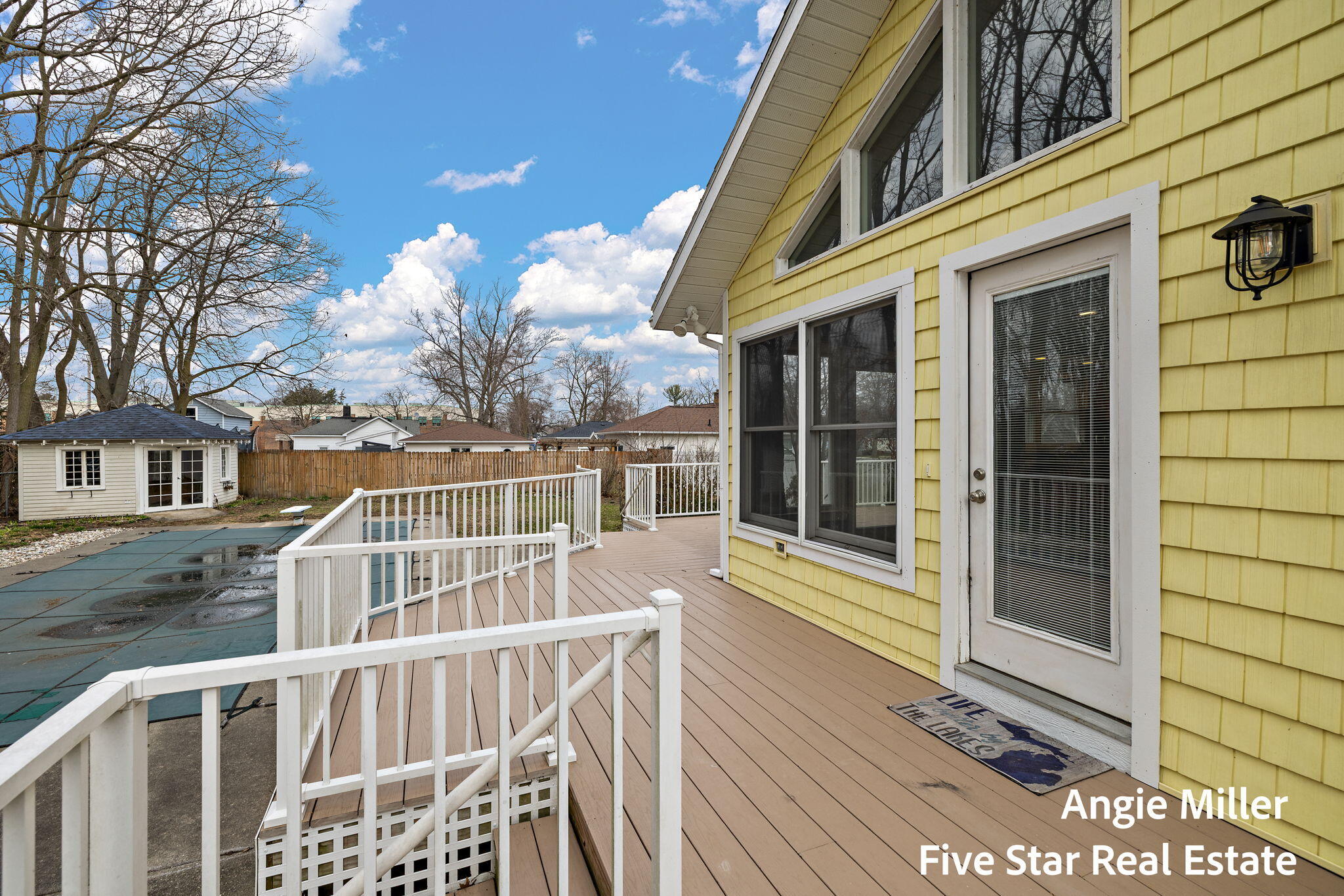 211 Williams Street Spring Lake, MI 49456 - Photo 5 of 67 back of home and deck