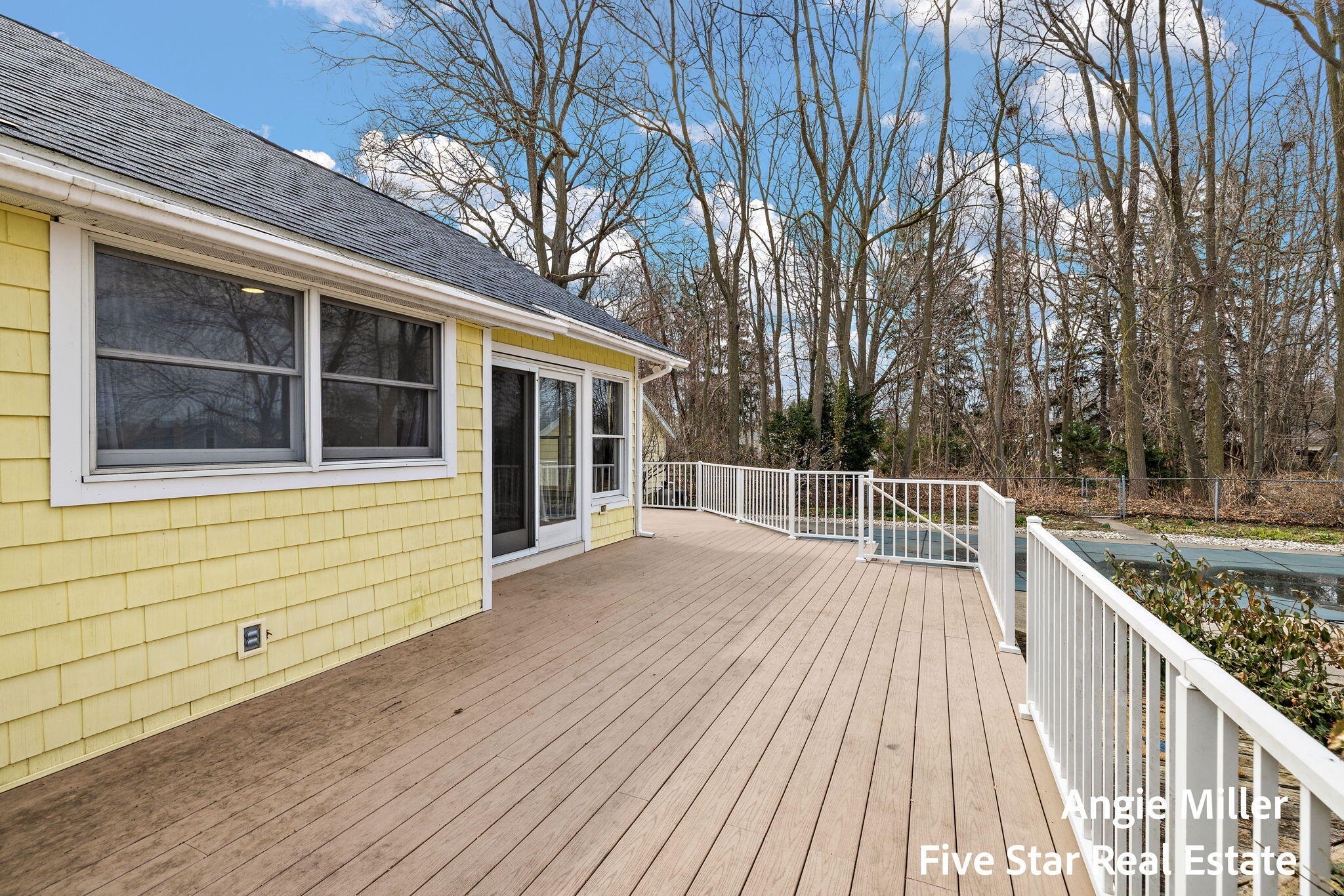 211 Williams Street Spring Lake, MI 49456 - Photo 6 of 67 back of home and deck