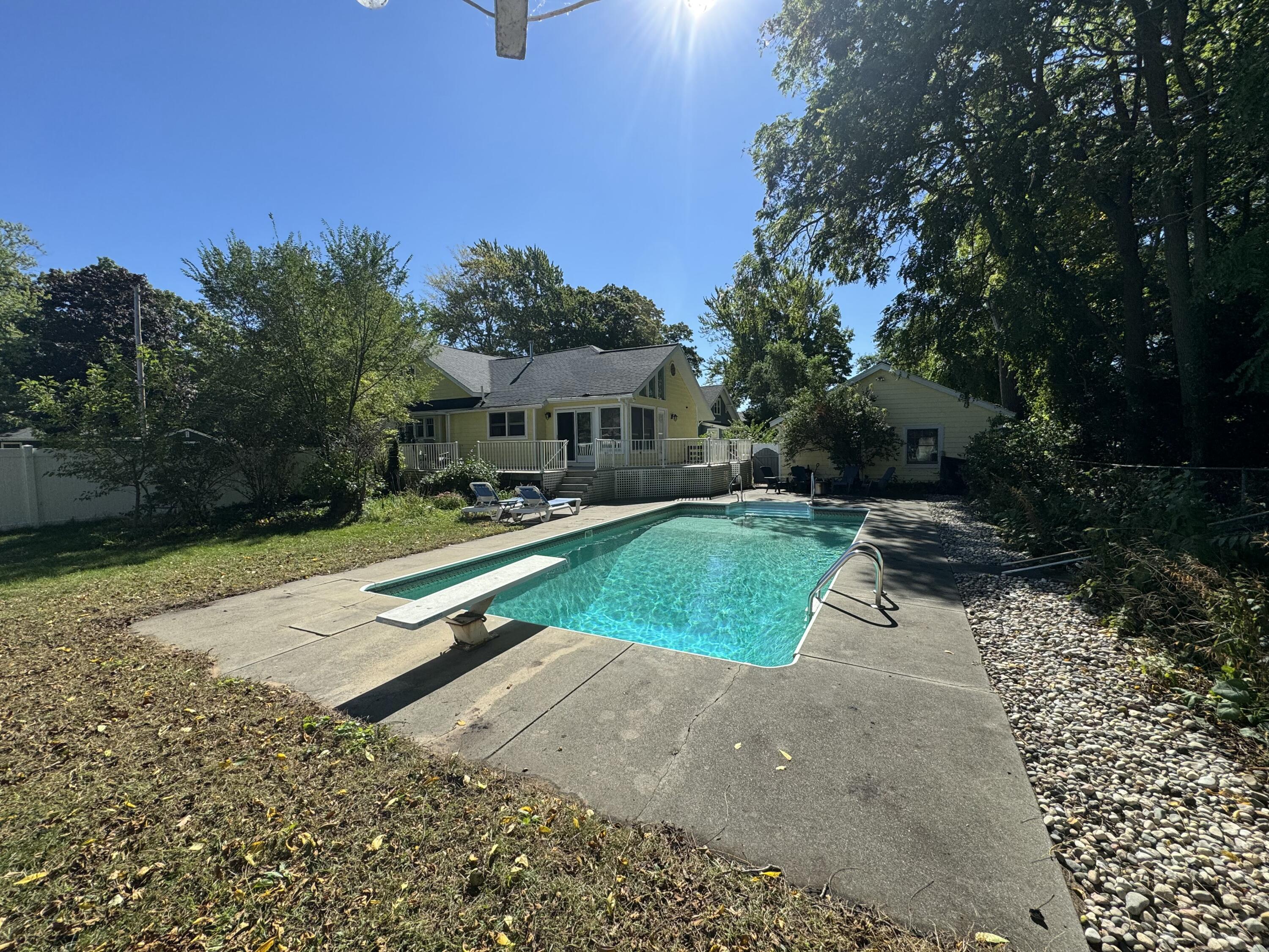 211 Williams Street Spring Lake, MI 49456 - Photo 8 of 67 summer 2025 pool