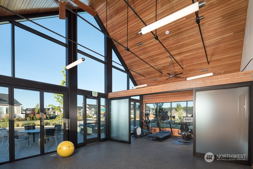 2740 Arrowroot Street Southeast Lacey, WA 98513 - Photo 14 of 15 a view of a room with gym equipment