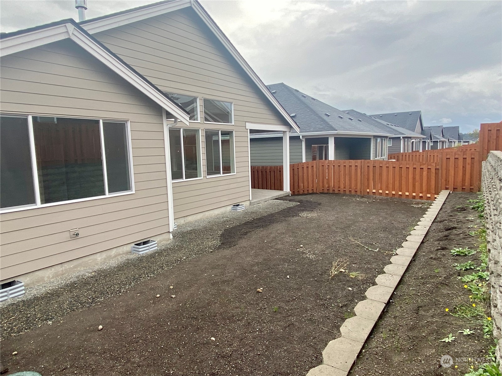 2740 Arrowroot Street Southeast Lacey, WA 98513 - Photo 6 of 15 a view of a house with a yard