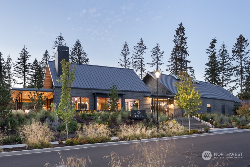 2740 Arrowroot Street Southeast Lacey, WA 98513 - Photo 9 of 15 a view of a house with a patio and a yard