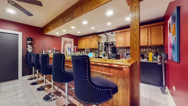 a room with lots of furniture and view of living room