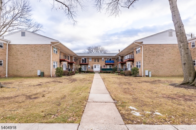 187 Evergreen Road Edison, NJ 08837 - Photo 8 of 8 a view of a city street lined with buildings