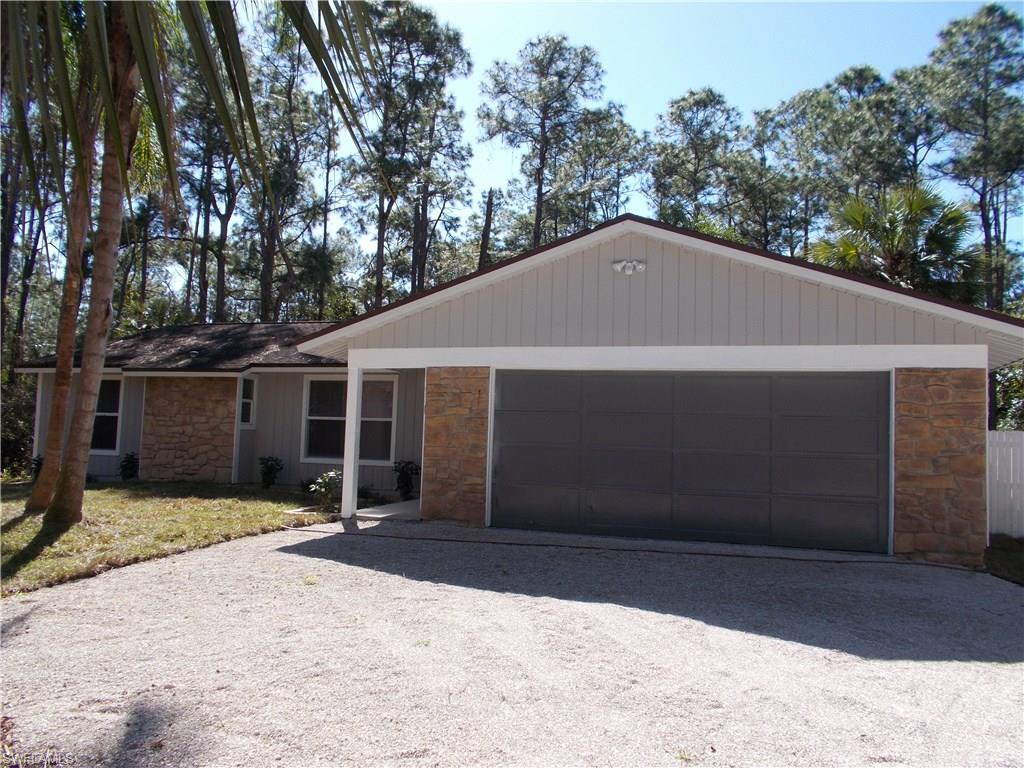 4180 Pine Ridge Road Naples, FL 34119 - Photo 1 of 25 FRONT OF YOUR NEW HOME LOCATED OFF OF PINE RIDGE ROAD