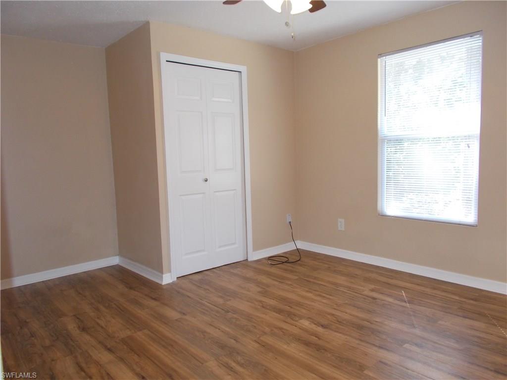 4180 Pine Ridge Road Naples, FL 34119 - Photo 11 of 25 PLENTY OF NATURAL LIGHT AND SPACE IN THIS GUEST BEDROOM