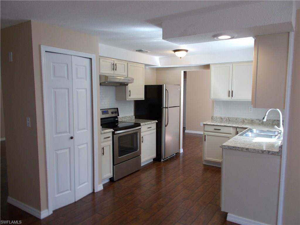 4180 Pine Ridge Road Naples, FL 34119 - Photo 13 of 25 VERY SPACIOUS KITCHEN AREA TO PREPARE YOUR FAVORITE MEALS