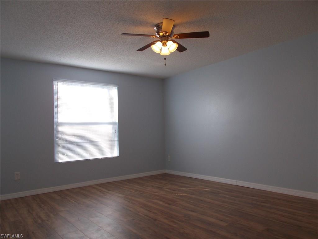 4180 Pine Ridge Road Naples, FL 34119 - Photo 17 of 25 VERY SPACIOUS MASTER BEDROOM THAT IS ON THE OTHER SIDE OF HOME FROM GUEST BEDROOMS