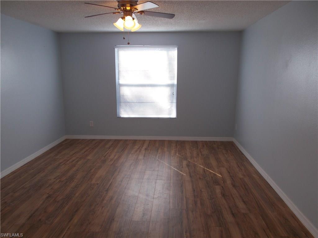 4180 Pine Ridge Road Naples, FL 34119 - Photo 18 of 25 PLENTY OF NATURAL LIGHT IN THIS LONG MASTER BEDROOM AREA TO ENJOY