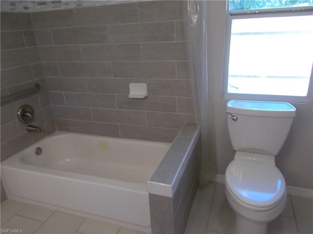 4180 Pine Ridge Road Naples, FL 34119 - Photo 21 of 25 RELAX AND ENJOY SOAKING IN YOUR BATHTUB