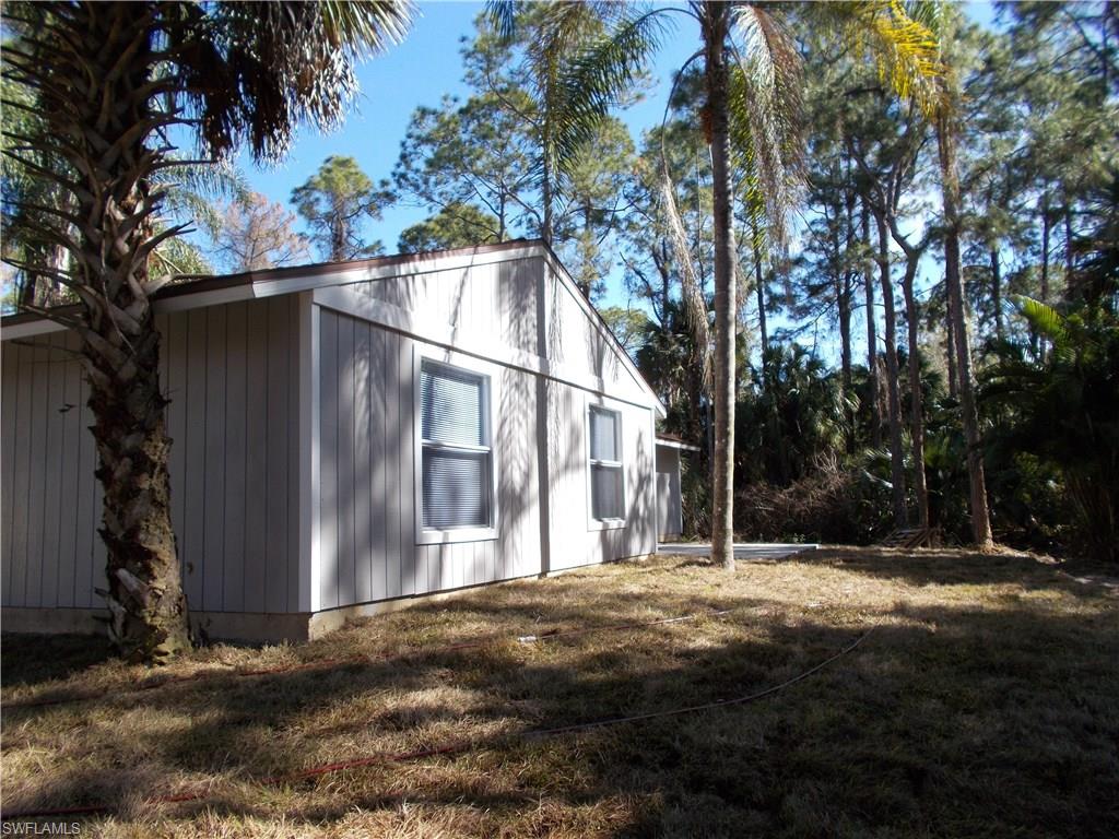 4180 Pine Ridge Road Naples, FL 34119 - Photo 25 of 25 BACK OF HOME WITH PLENTY OF SPACE TO ENTERTAIN