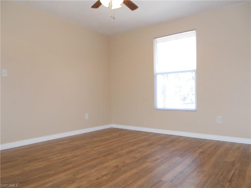4180 Pine Ridge Road Naples, FL 34119 - Photo 6 of 25 SPACIOUS GUEST BEDROOM IN THE FRONT OF THE HOME