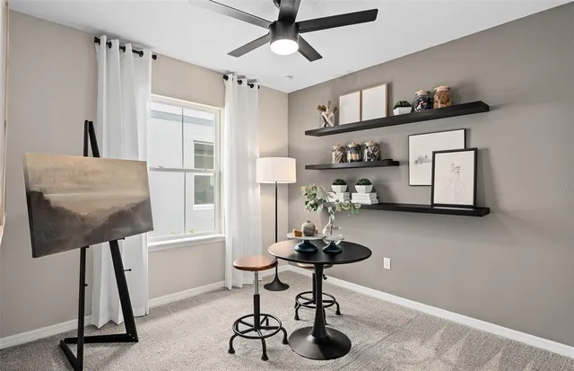 a view of a workspace with furniture