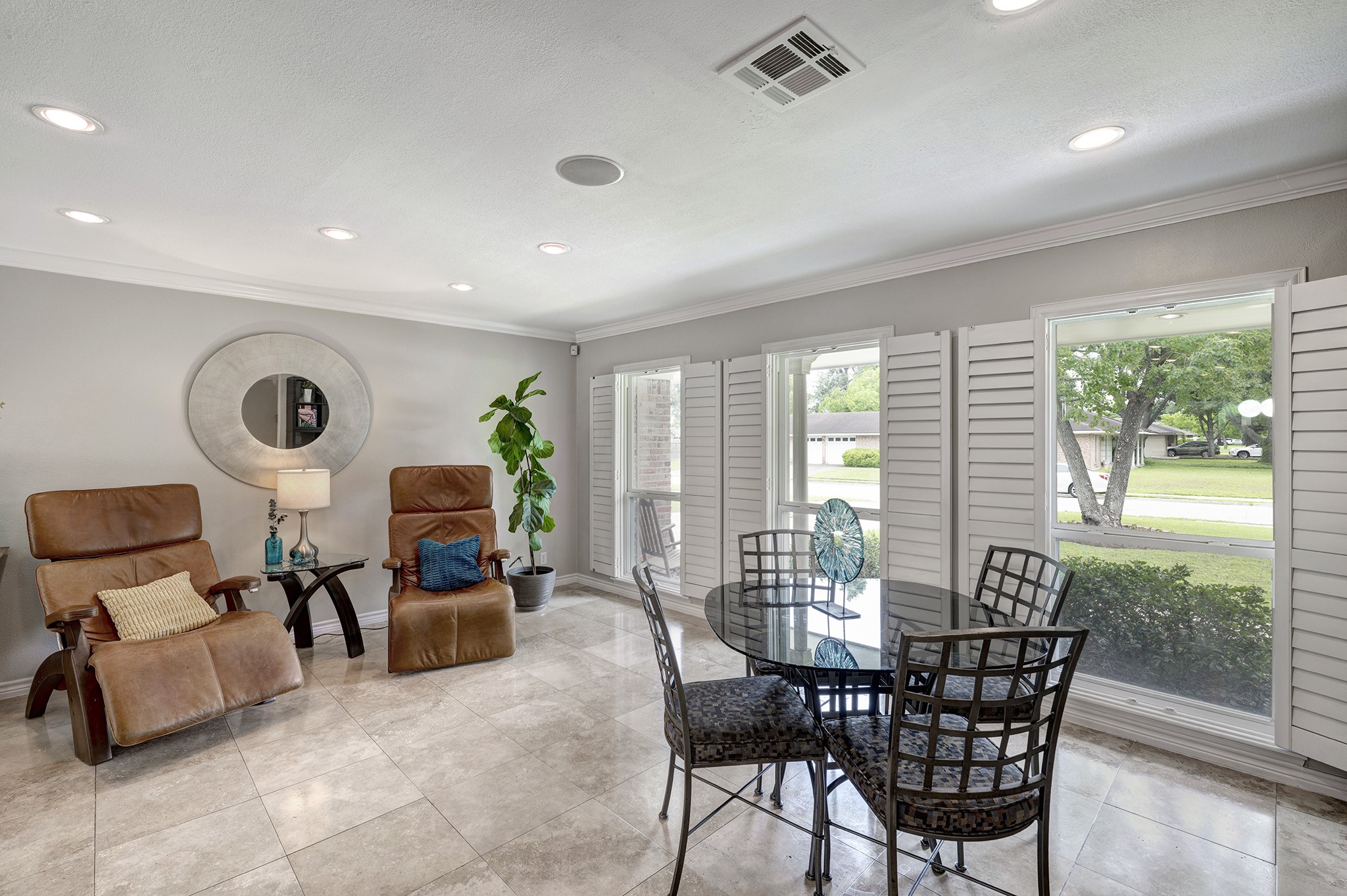 1111 Clovis Road Houston, TX 77008 - Photo 2 of 32 Upon entering, you are greeted by a light-filled expansive Dining / Seating area that can also function as a formal living room.