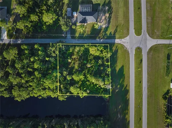 aerial view of a house with a garden