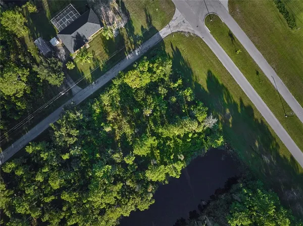 a view of a house with a big yard