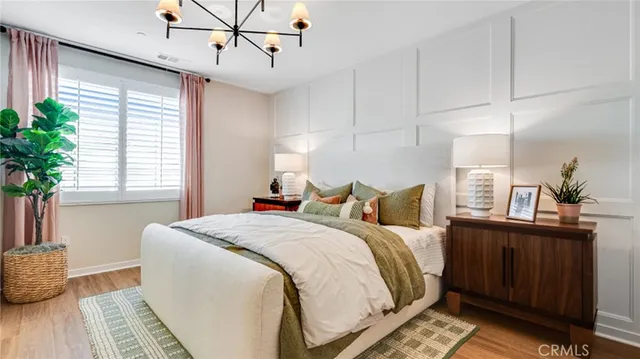 a bed room with a bed and a window