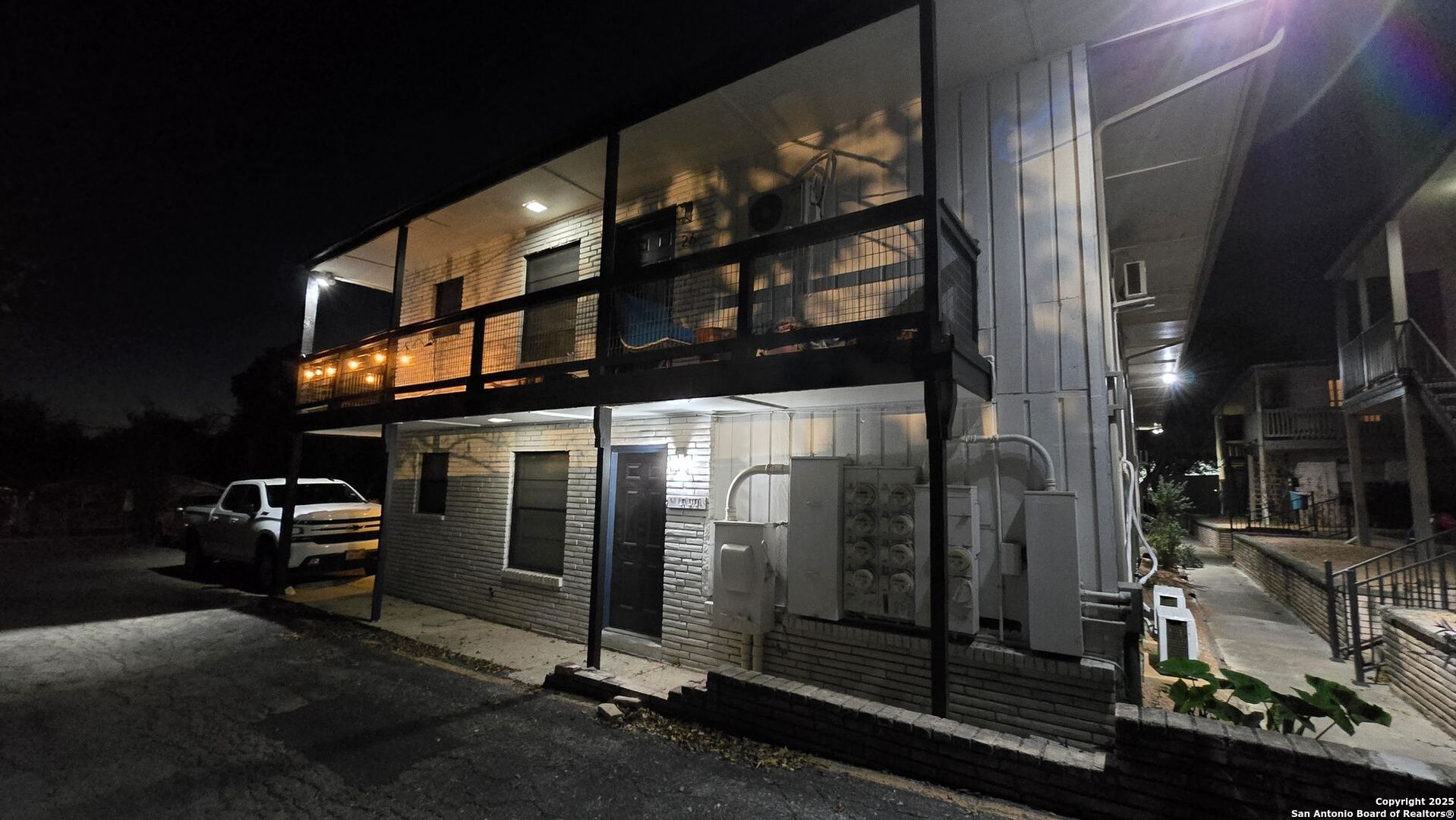 516 Gentleman Road, Unit 8 Balcones Heights, TX 78201 - Photo 31 of 33 a view of a building with car parked