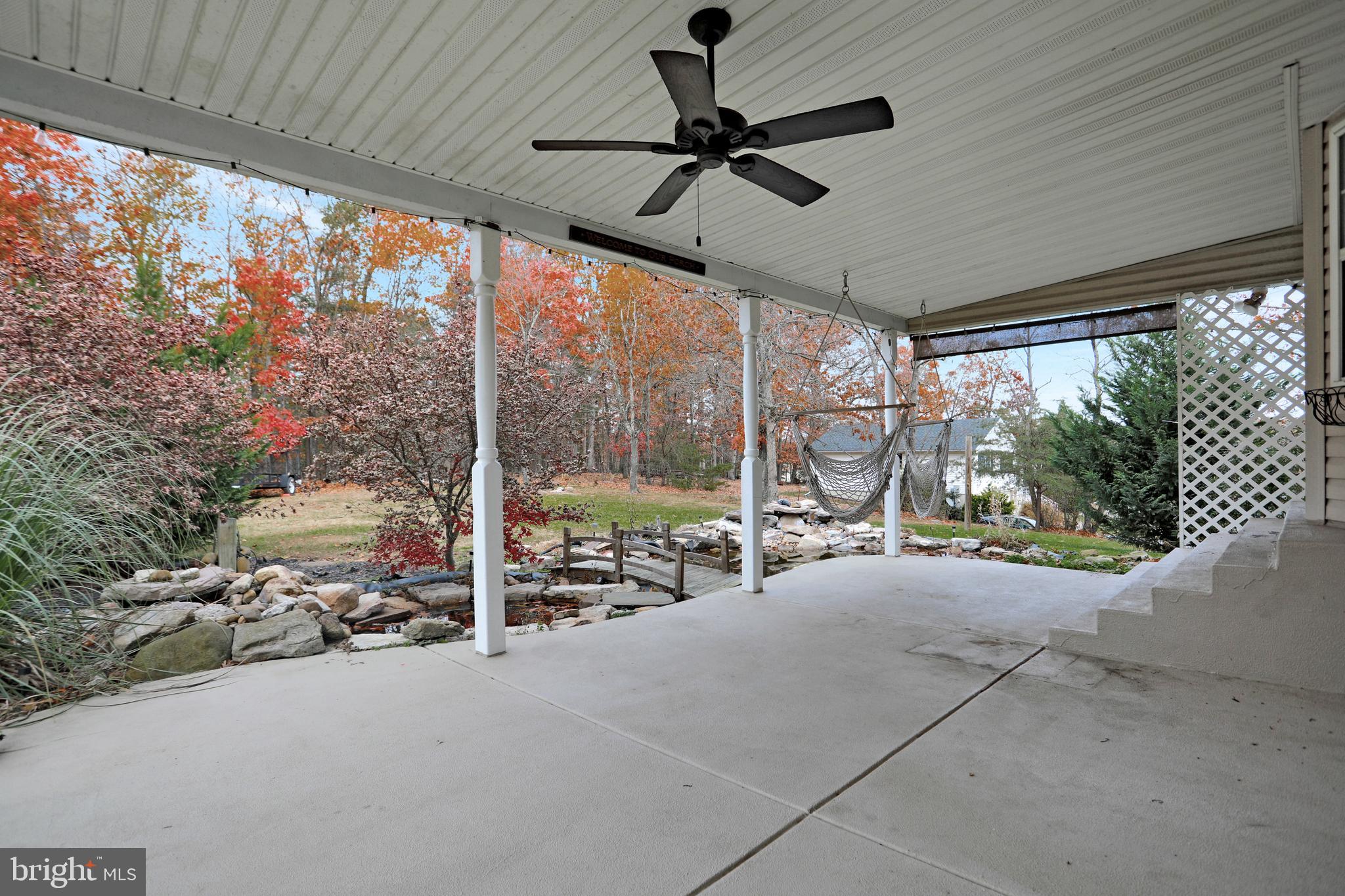 343 Ridge View Drive Berkeley Springs, WV 25411 - Photo 4 of 62 Rear Covered Patio