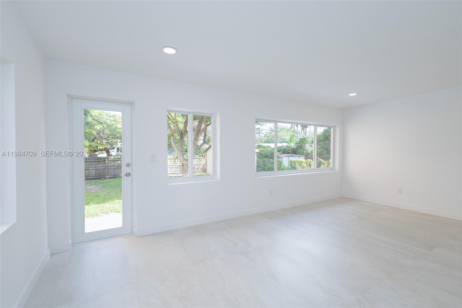 2675 Southwest 24th Terrace Miami, FL 33145 - Photo 13 of 36 an empty room with windows