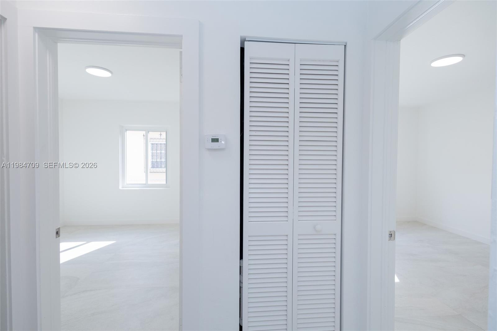 2675 Southwest 24th Terrace Miami, FL 33145 - Photo 21 of 36 a view of an empty room with closet and a window