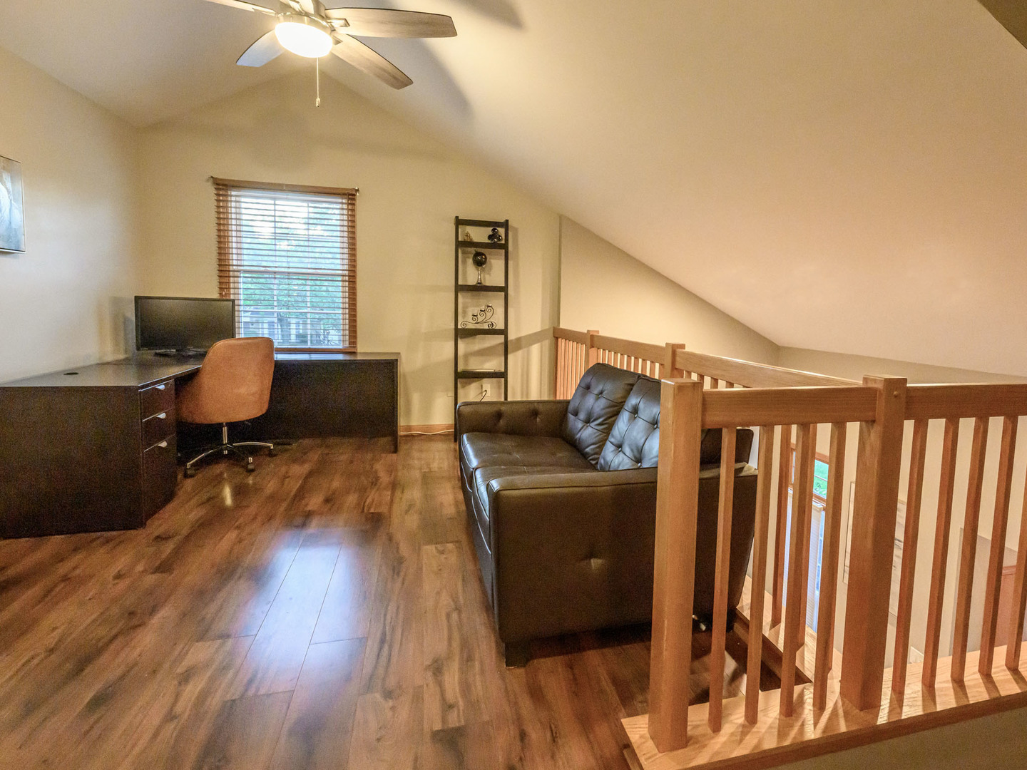 10111 Cambridge Drive, Unit COURTG Mokena, IL 60448 - Photo 16 of 31 a living room with furniture and a wooden floor