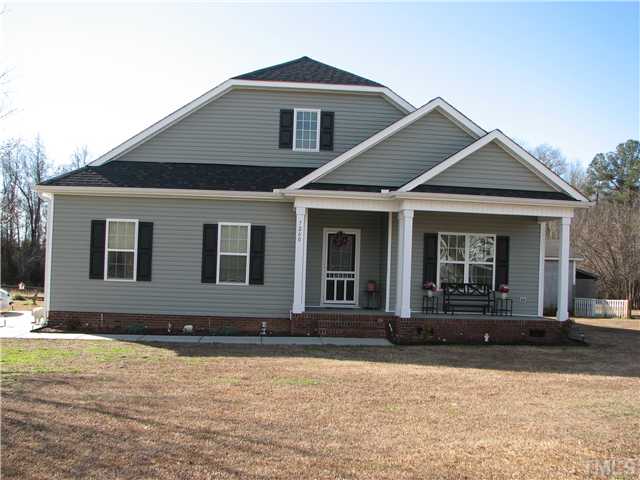 7260 Turner Fish Road Willow Spring, NC 27592 - Photo 1 of 14 front view of a house