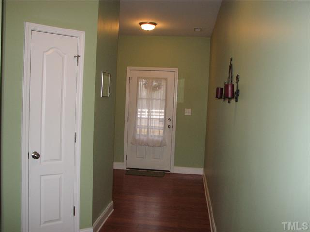 7260 Turner Fish Road Willow Spring, NC 27592 - Photo 10 of 14 a view of hallway with wooden floor