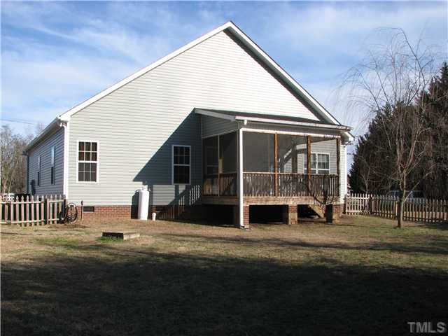 7260 Turner Fish Road Willow Spring, NC 27592 - Photo 12 of 14 a view of a house with backyard