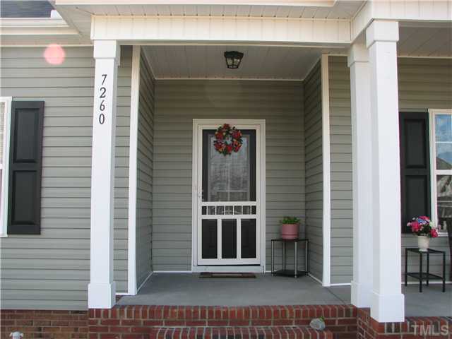 7260 Turner Fish Road Willow Spring, NC 27592 - Photo 13 of 14 a view of a door and a window