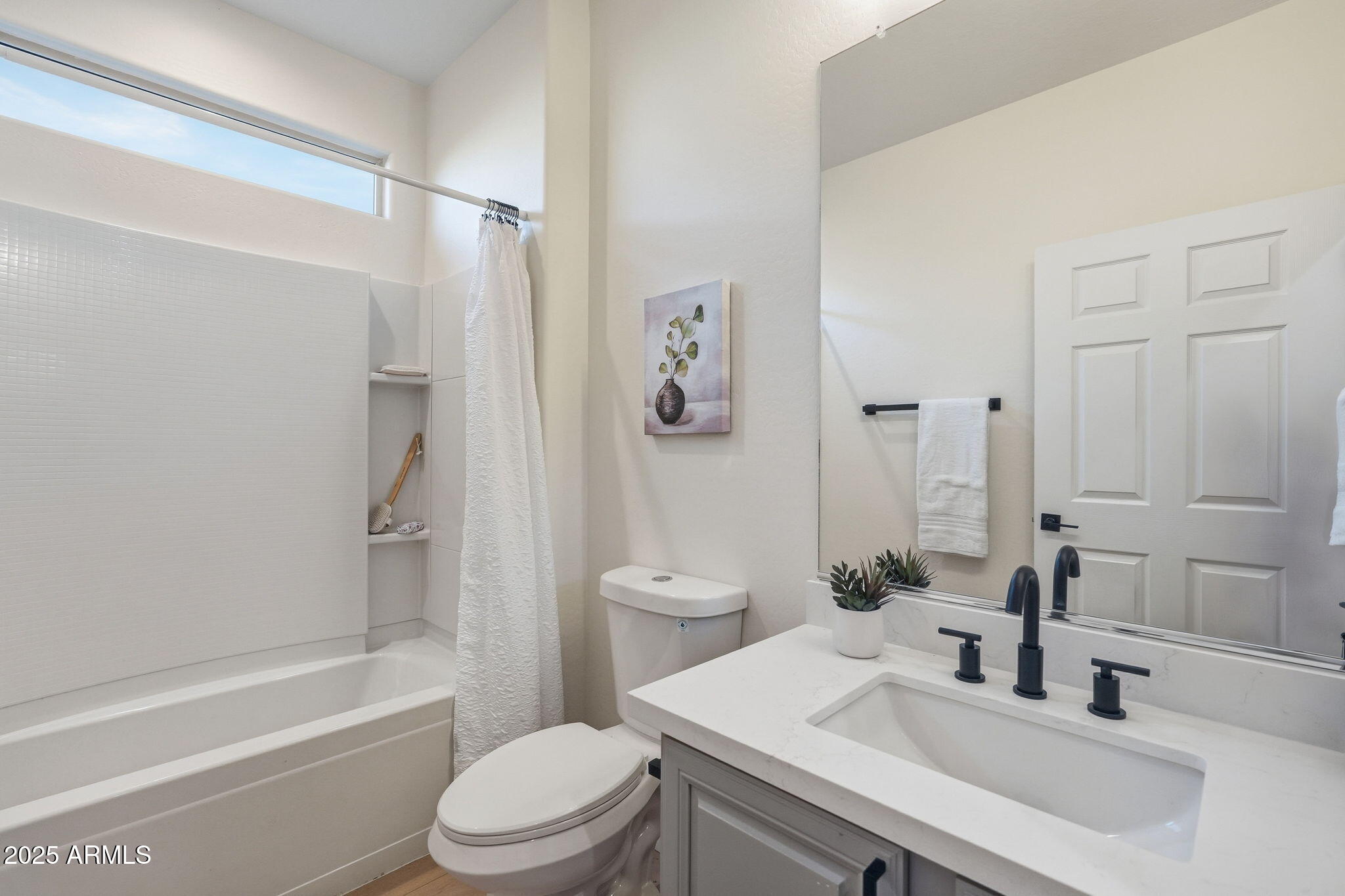 8159 West Cinder Brook Way Florence, AZ 85132 - Photo 20 of 32 a bathroom with a sink toilet tub and shower