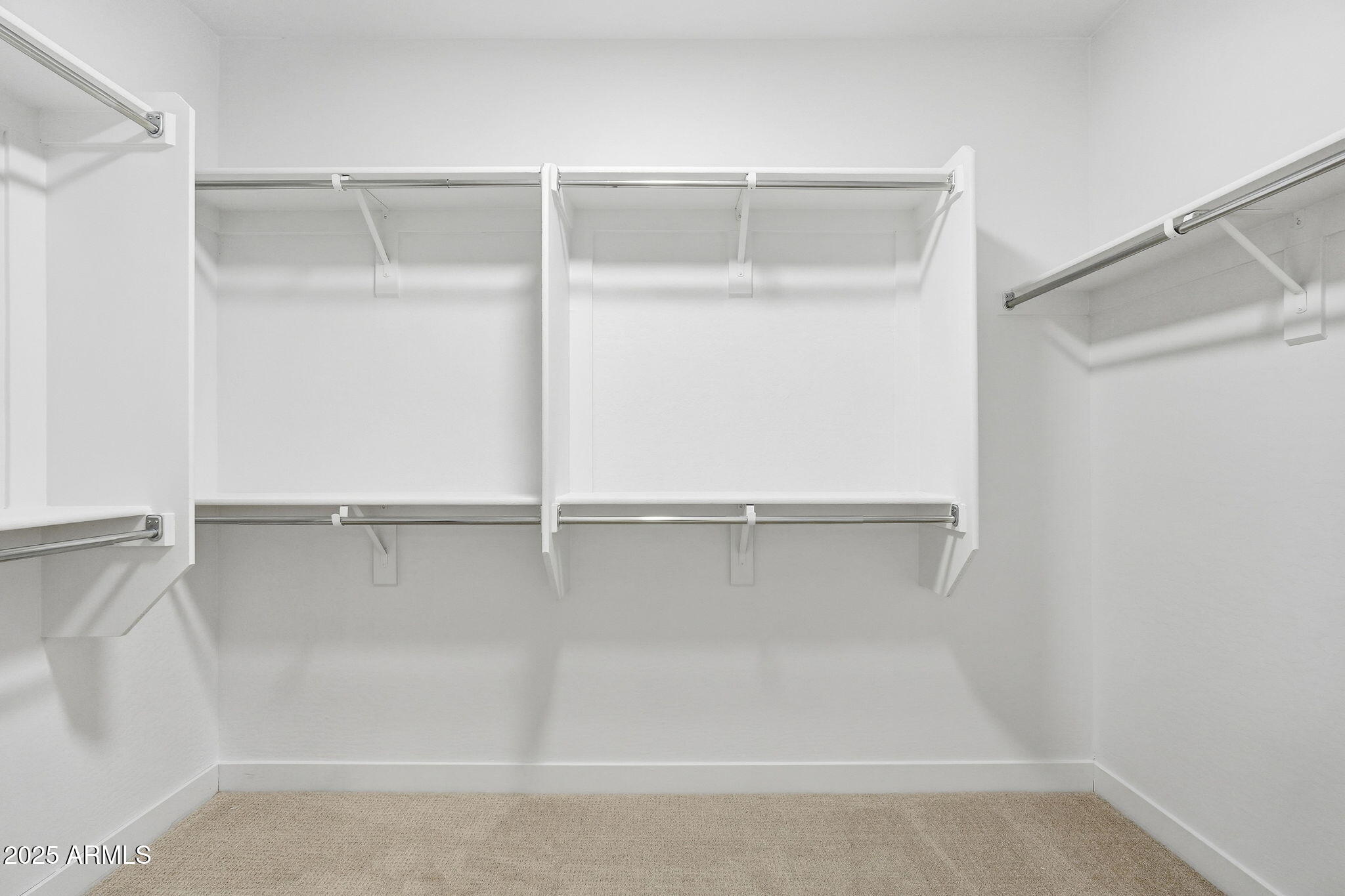 8159 West Cinder Brook Way Florence, AZ 85132 - Photo 26 of 32 a view of an empty walk in closet