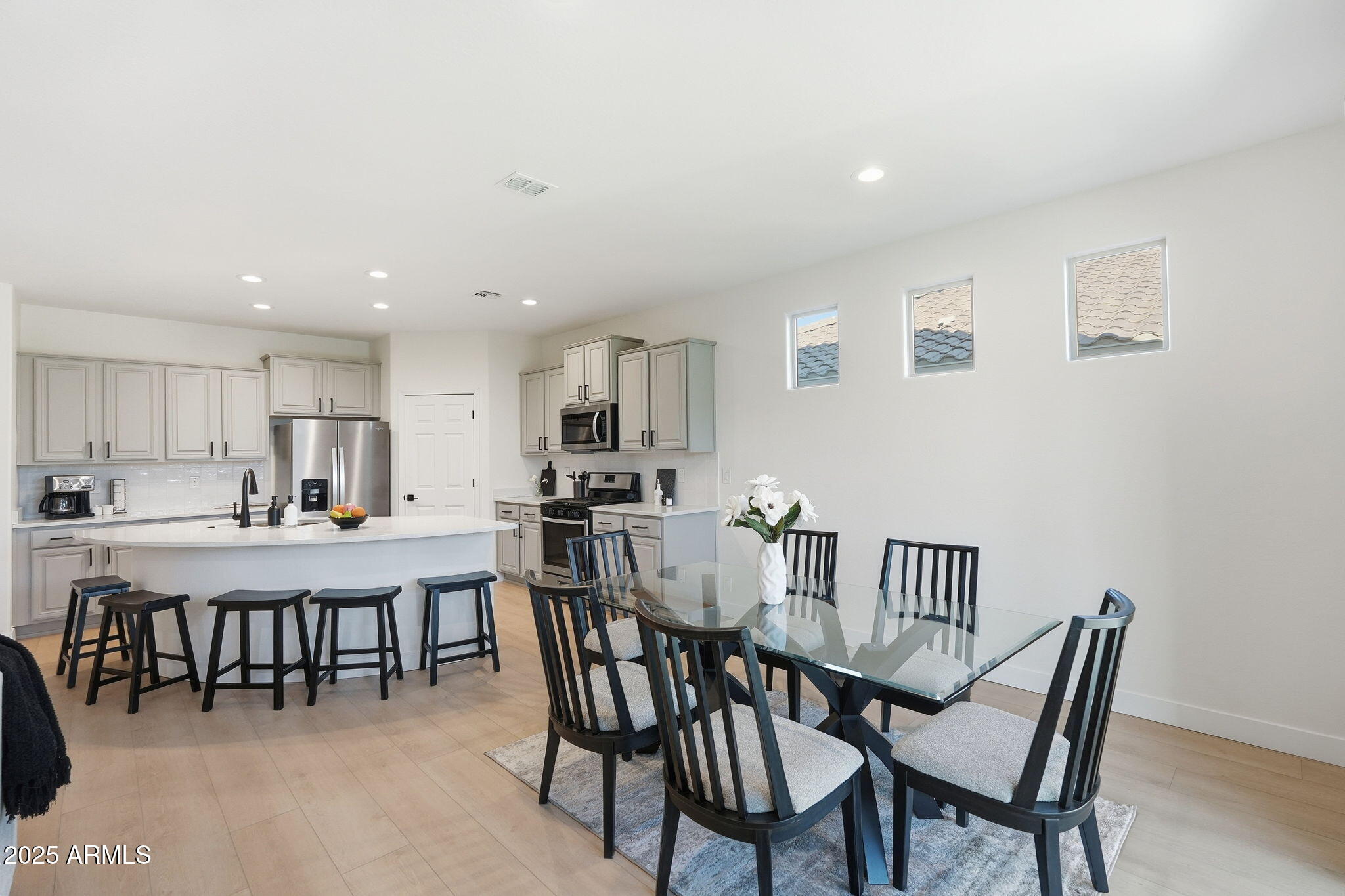 8159 West Cinder Brook Way Florence, AZ 85132 - Photo 8 of 32 a view of a dining room with furniture