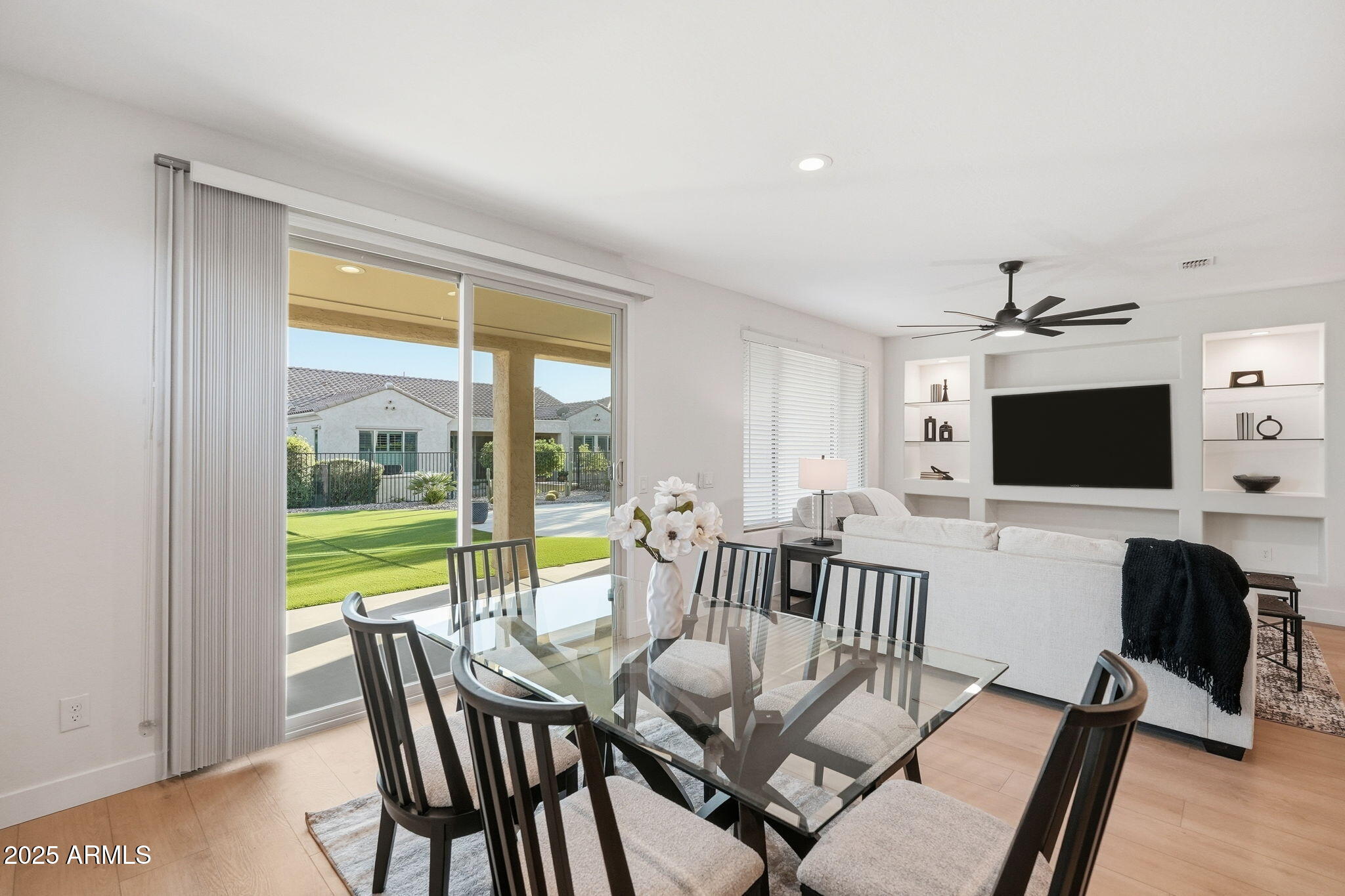 8159 West Cinder Brook Way Florence, AZ 85132 - Photo 10 of 32 a view of a dining room with furniture window and outside view
