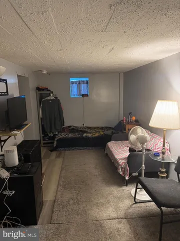 a kitchen with a sink appliances and cabinets