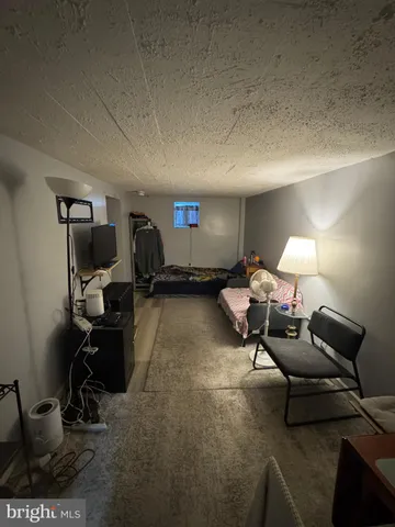 a kitchen with a stove and a refrigerator