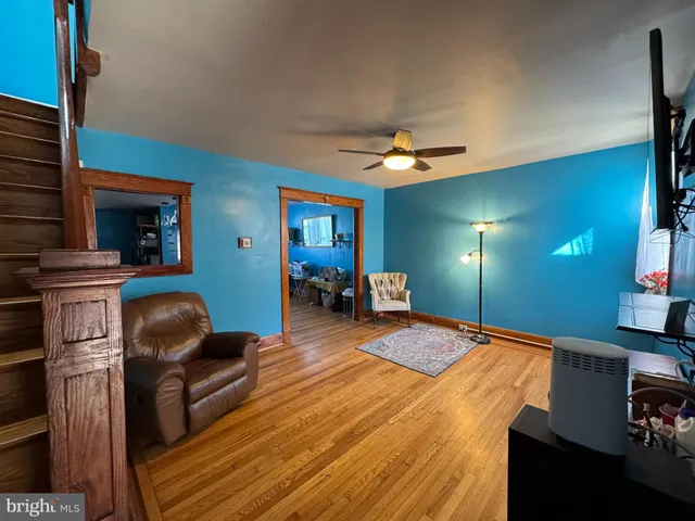 a bedroom with furniture and a chandelier