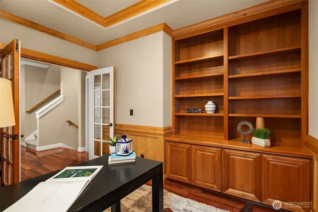 a view of a workspace with furniture