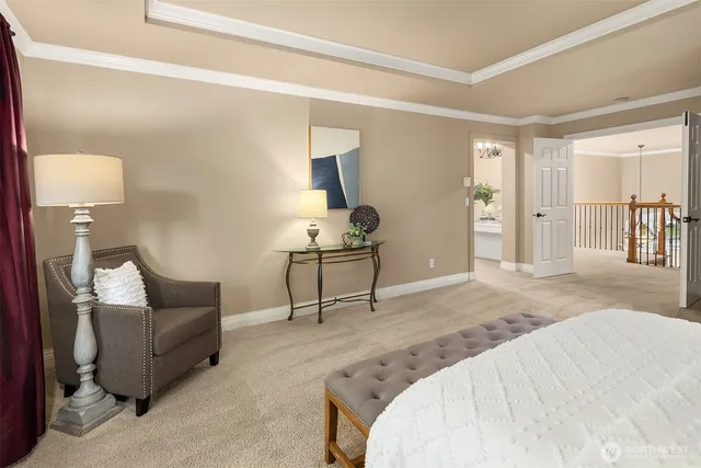 a view of walk in closet with clothes