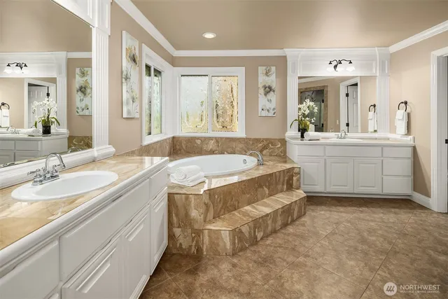 a view of a roof deck with table and chairs with wooden floor and fence