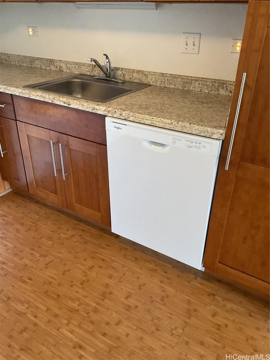 85-003 Pokai Bay Street, Unit 403 Waianae, HI 96792 - Photo 12 of 22 a view of a storage and utility room with a sink