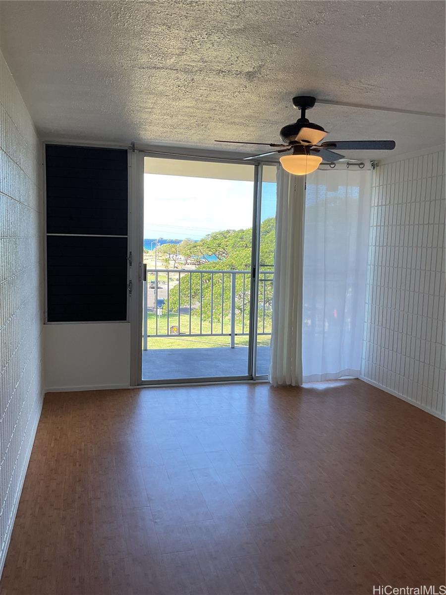 85-003 Pokai Bay Street, Unit 403 Waianae, HI 96792 - Photo 15 of 22 a view of an empty room with a window