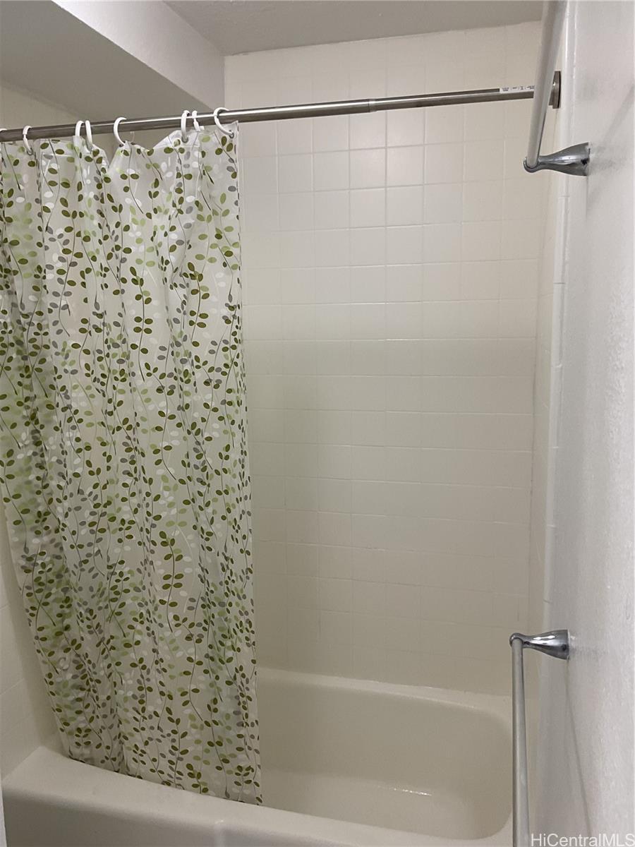 85-003 Pokai Bay Street, Unit 403 Waianae, HI 96792 - Photo 16 of 22 a bathroom with a shower