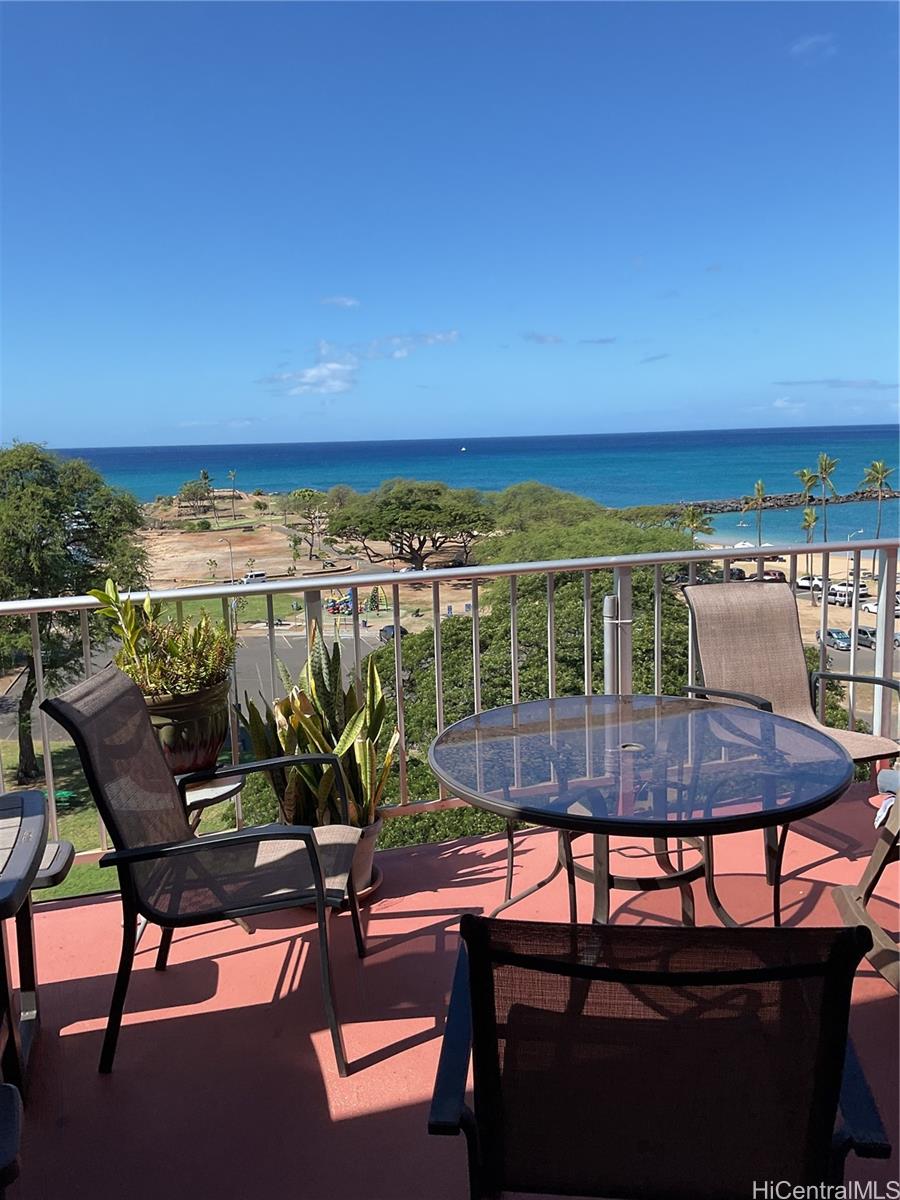 85-003 Pokai Bay Street, Unit 403 Waianae, HI 96792 - Photo 21 of 22 a view of a chairs and table on the terrace